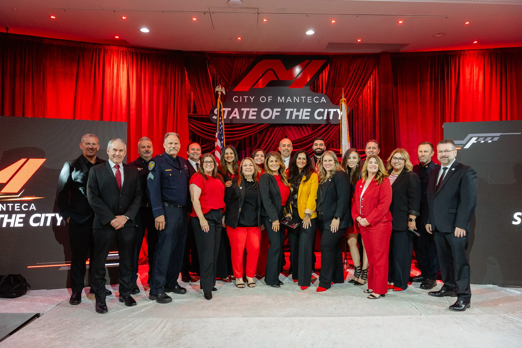 City of Manteca State of the City event with custom signage displayed on stage