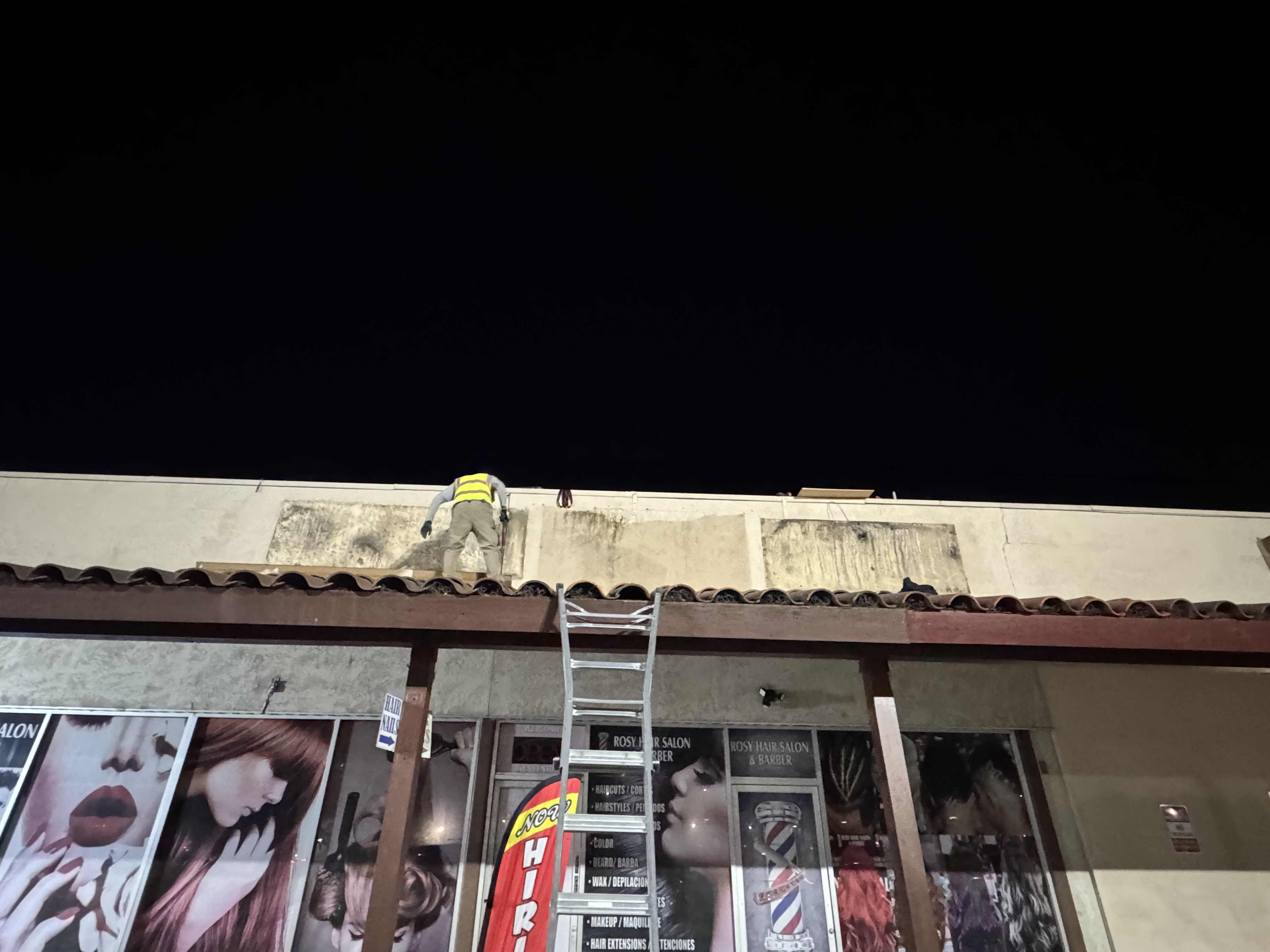 03 Removal of the previous storefront signs — Rosy's Hair Salon & Barber — Modesto, CA