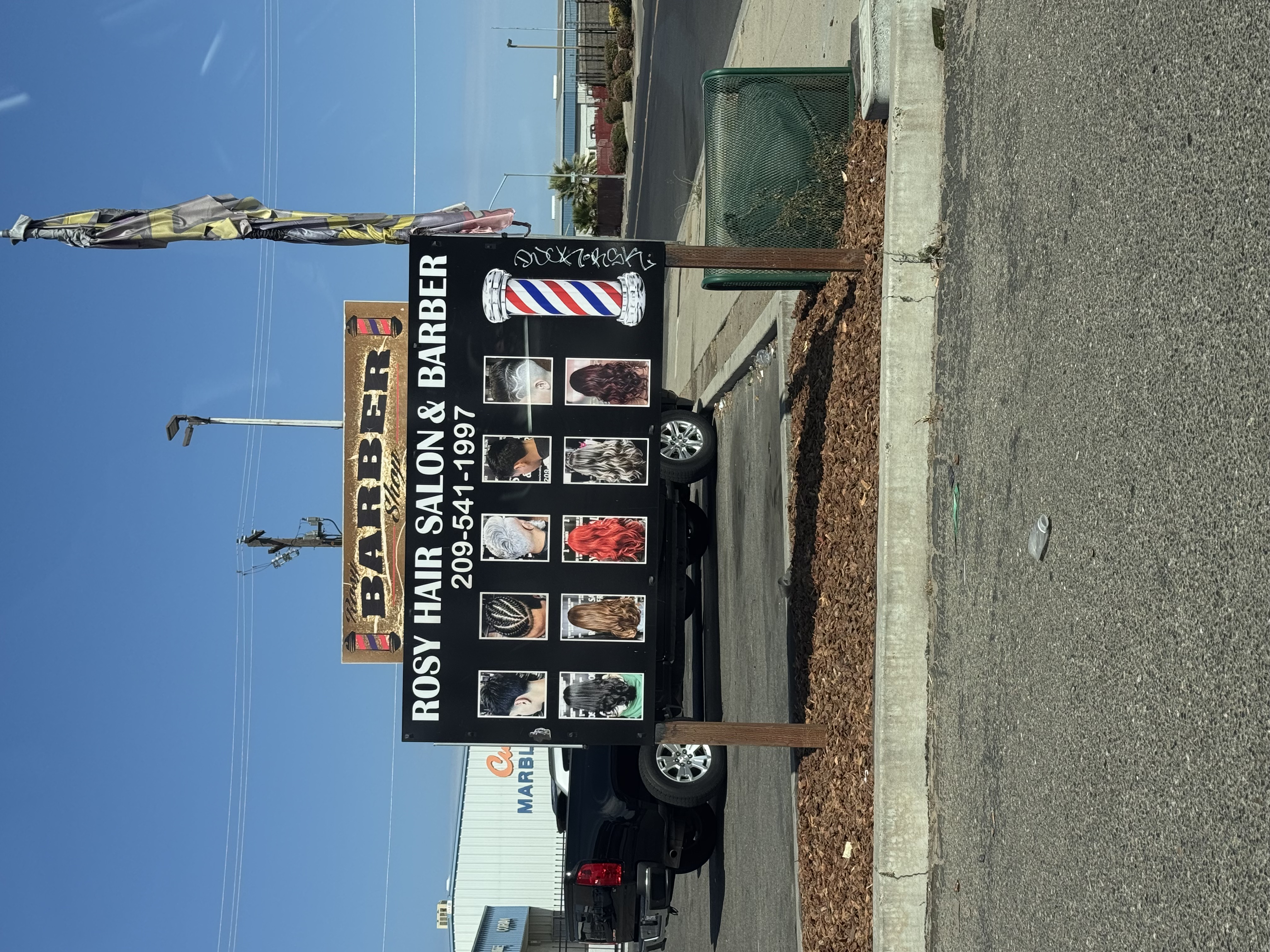 07 Previous parking lot sign — Rosy's Hair Salon & Barber — Modesto, CA